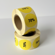Yellow discount sticker 70%. Roll of 500 pcs. Ø 30 mm.