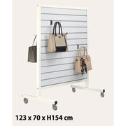 Gondola on white metal frame with grooved white panels and aluminum trim
