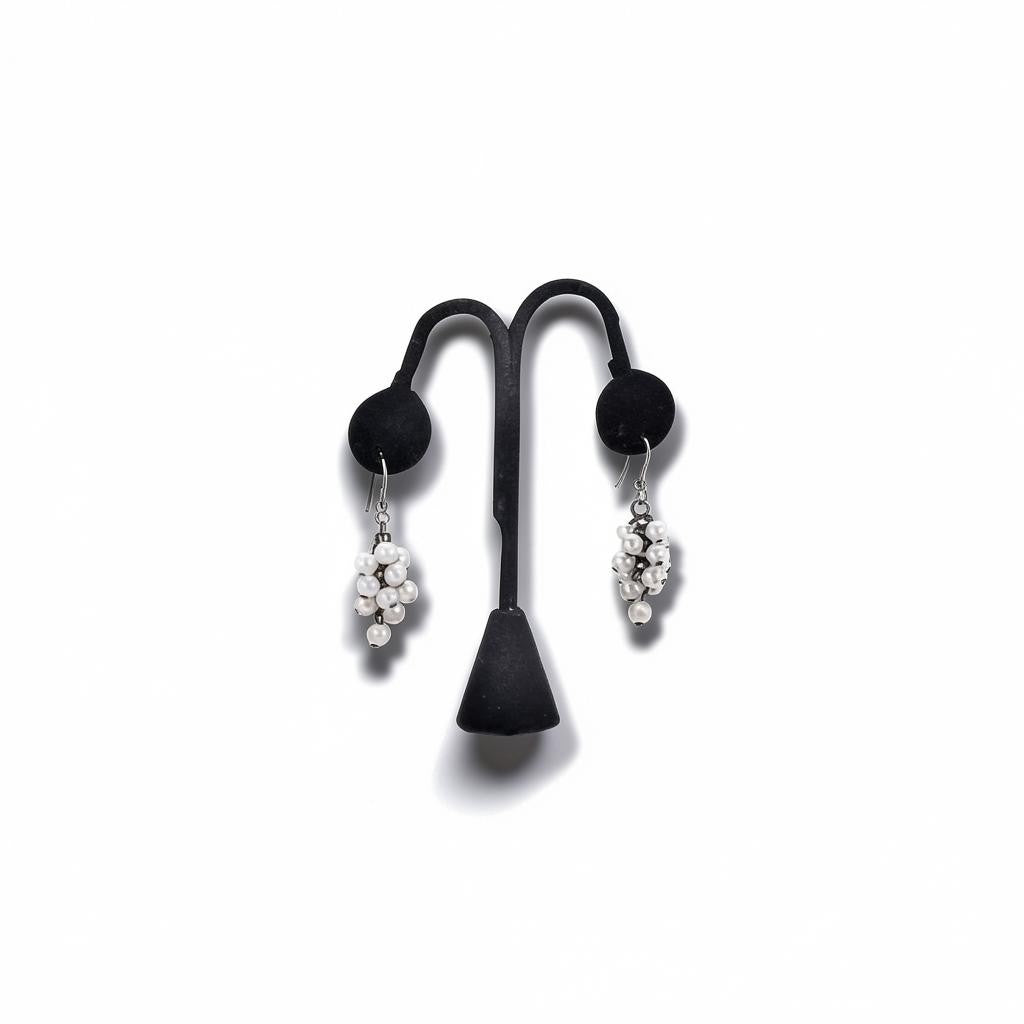 Ear piercing display 1 pair. Black flock. H 12 cm.