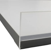 Angled white melamine shelf with white front edge, 119 x 27 cm