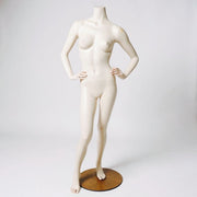 Headless female mannequin. White, matte without head. Round glass base plate. Fiberglass.
