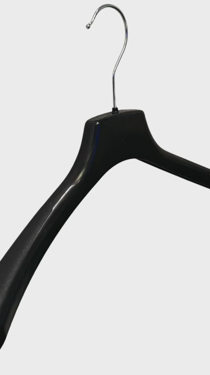 Load video: Heavy-duty jacket hanger, plastic, black, 42 cm, 4.0 cm shoulder, packed with 125 pcs. Lightweight